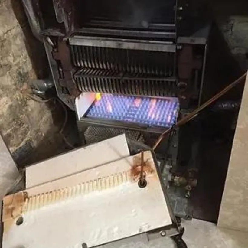 Clean blue flame on a back boiler burner after a service